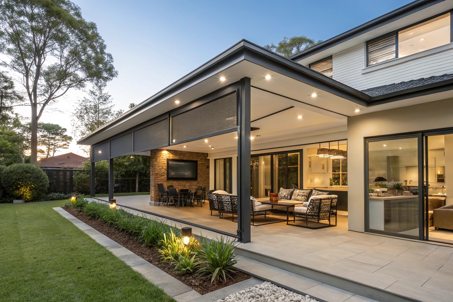 Modern Canberra home with enclosed patio featuring retractable screens and entertainment area
