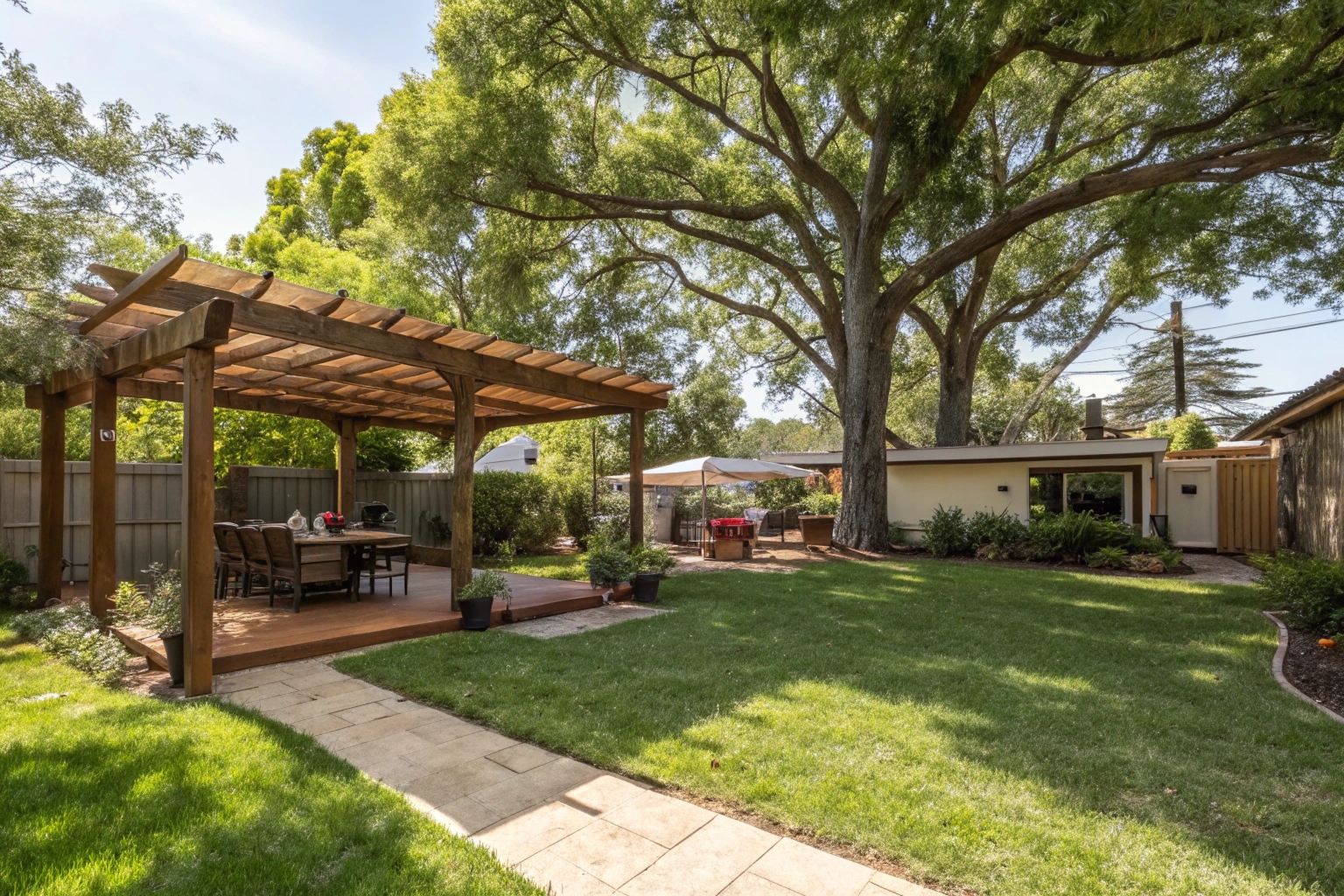 Timber pergola over an outdoor entertaining area in an established Griffith property